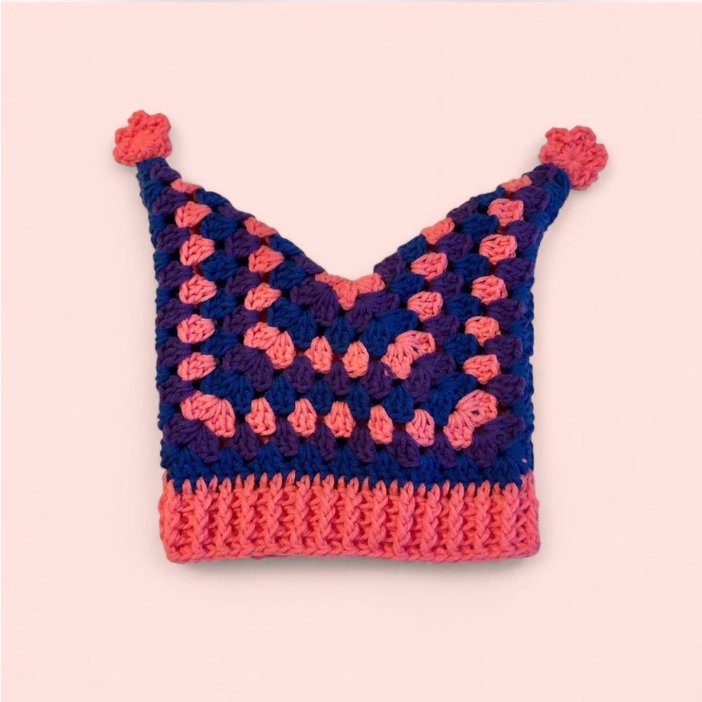 crochet bi pride jester hat with mini pink stars